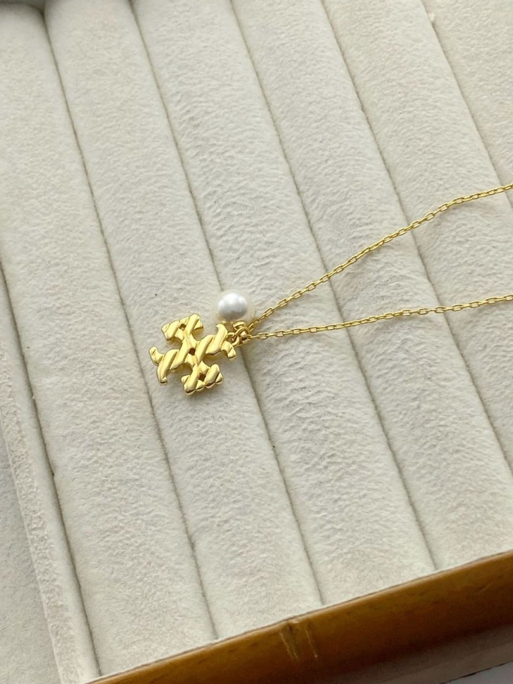 Tory Burch Gold Logo Pendant Necklace with White Pearl Accent